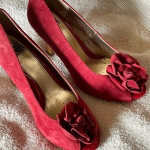 Adorable red Sofft open toe pumps with rose detail. Size 6